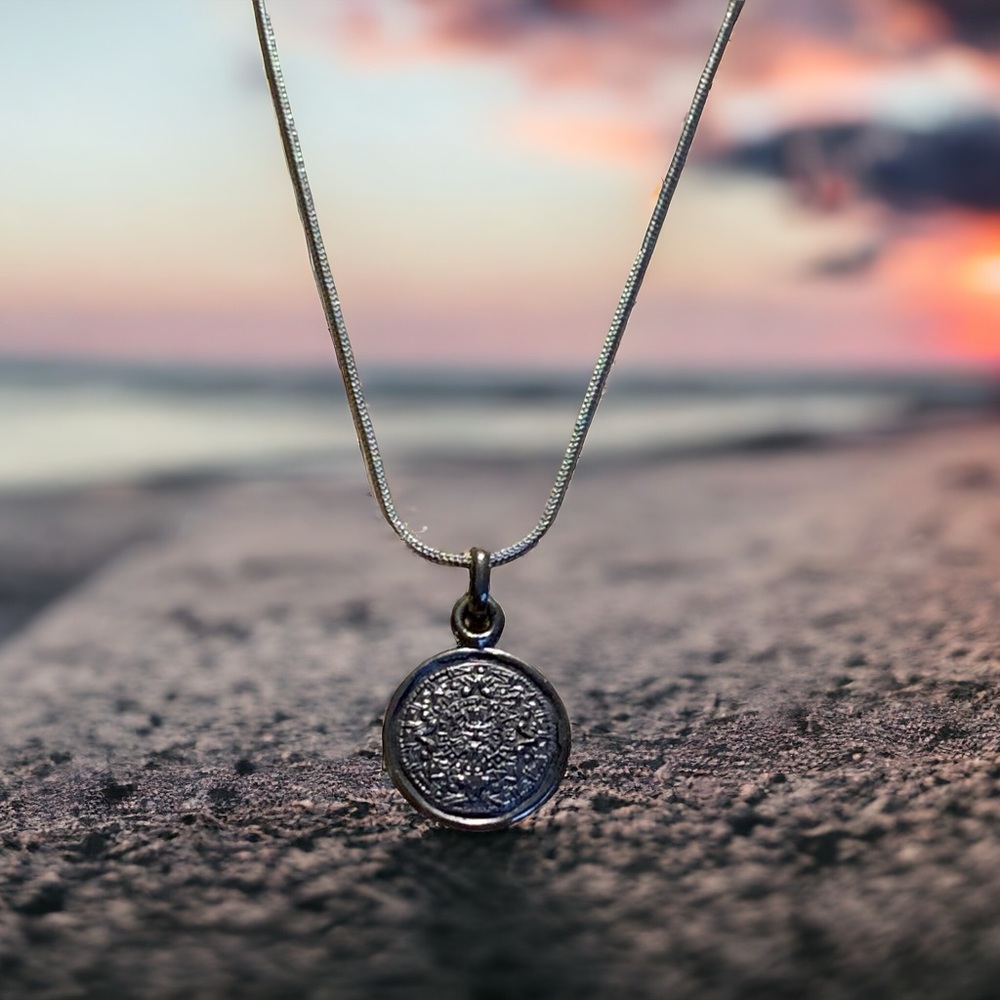 Aztec calendar necklace. Vintage sterling.